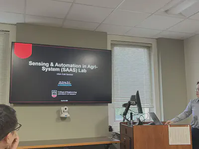 Prof. Xin Zhang presenting during the joint seminar.